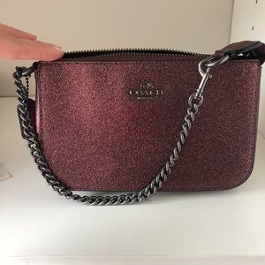 Coach purple glitter wristlet.